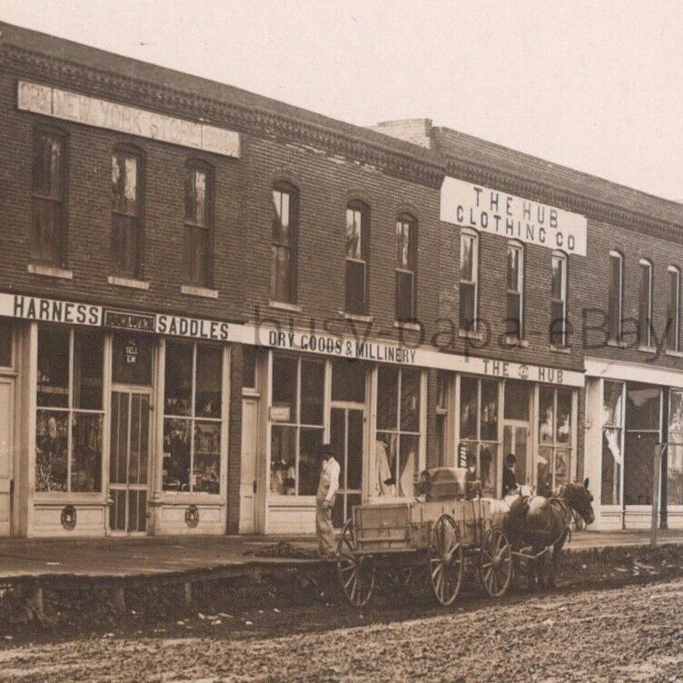 1908 RPPC South Side Square Hub Clothing Company Williamsburg Iowa Postcard