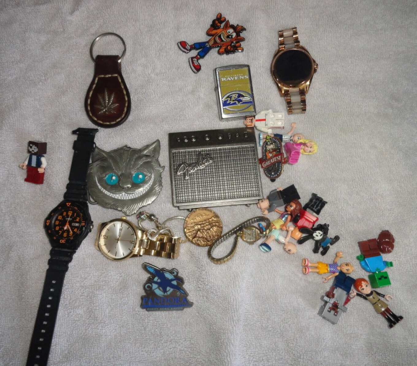 WHOLESALE LOT OF ITEMS BELT BUCKLES LEGO MEN WATCHES LIGHTER PINS