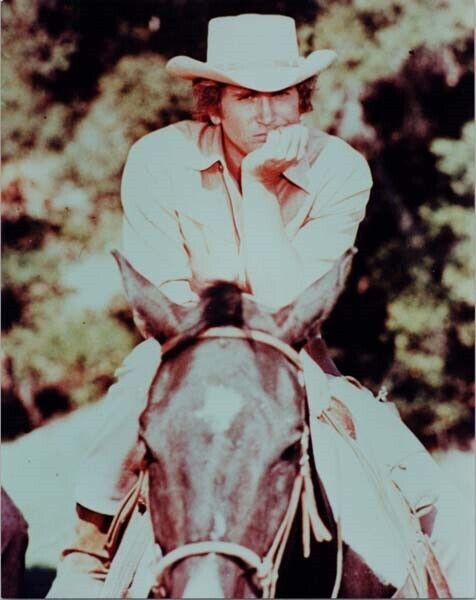 Michael Landon as Little Joe seated on horse 1970's era Bonanza 8x10 inch photo