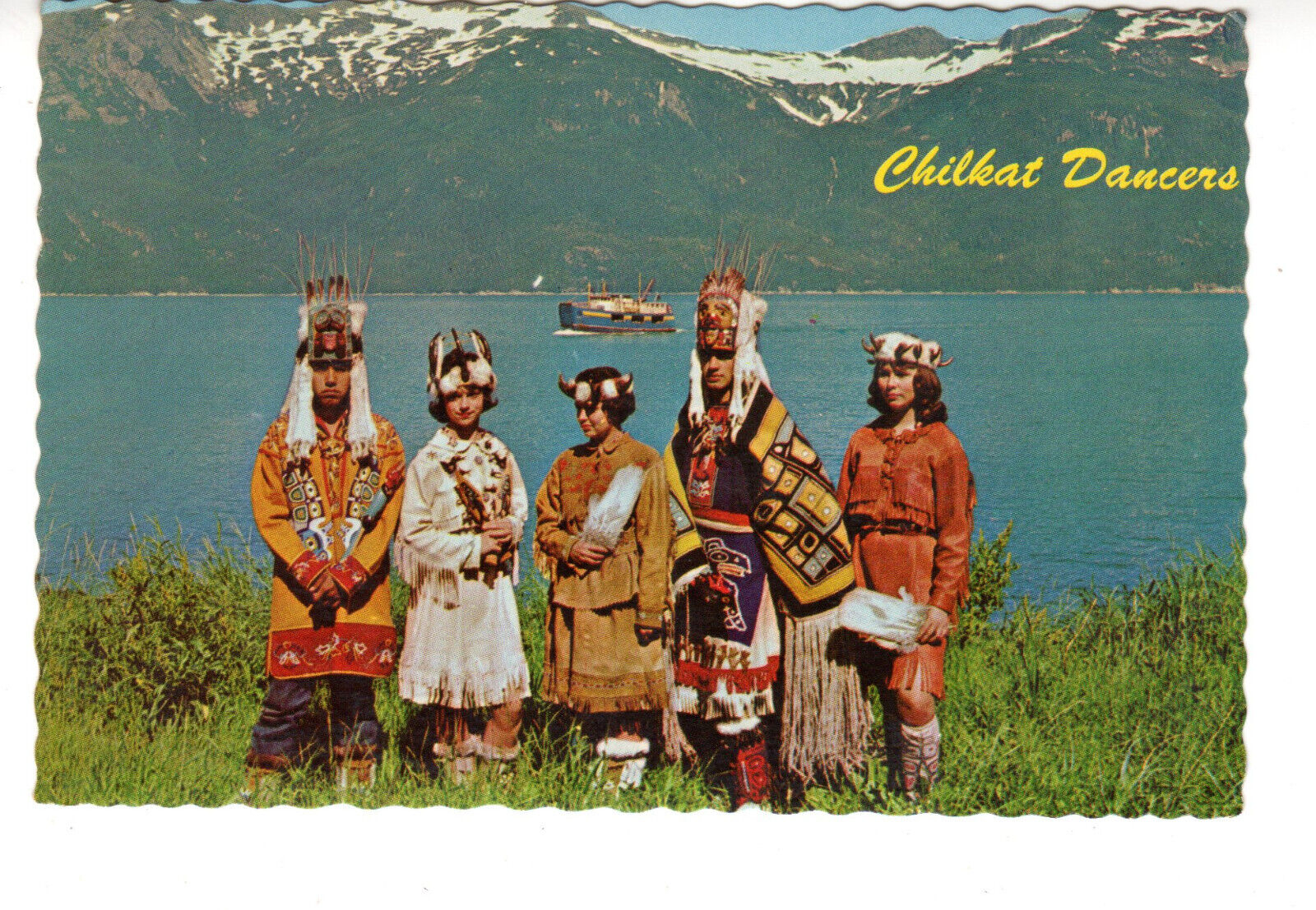 Postcard: Alaskan Chilkat Dancers in native attire standing by Lynn Canal