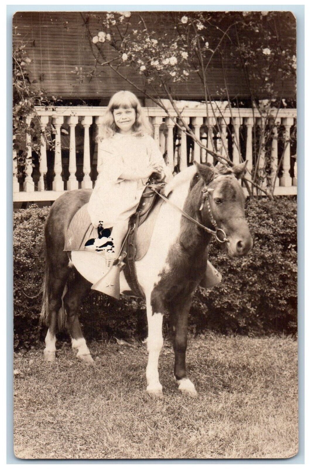 c1905 Candid Girl Horse Pony Saddle Bridle Flowers RPPC Photo Unposted Postcard