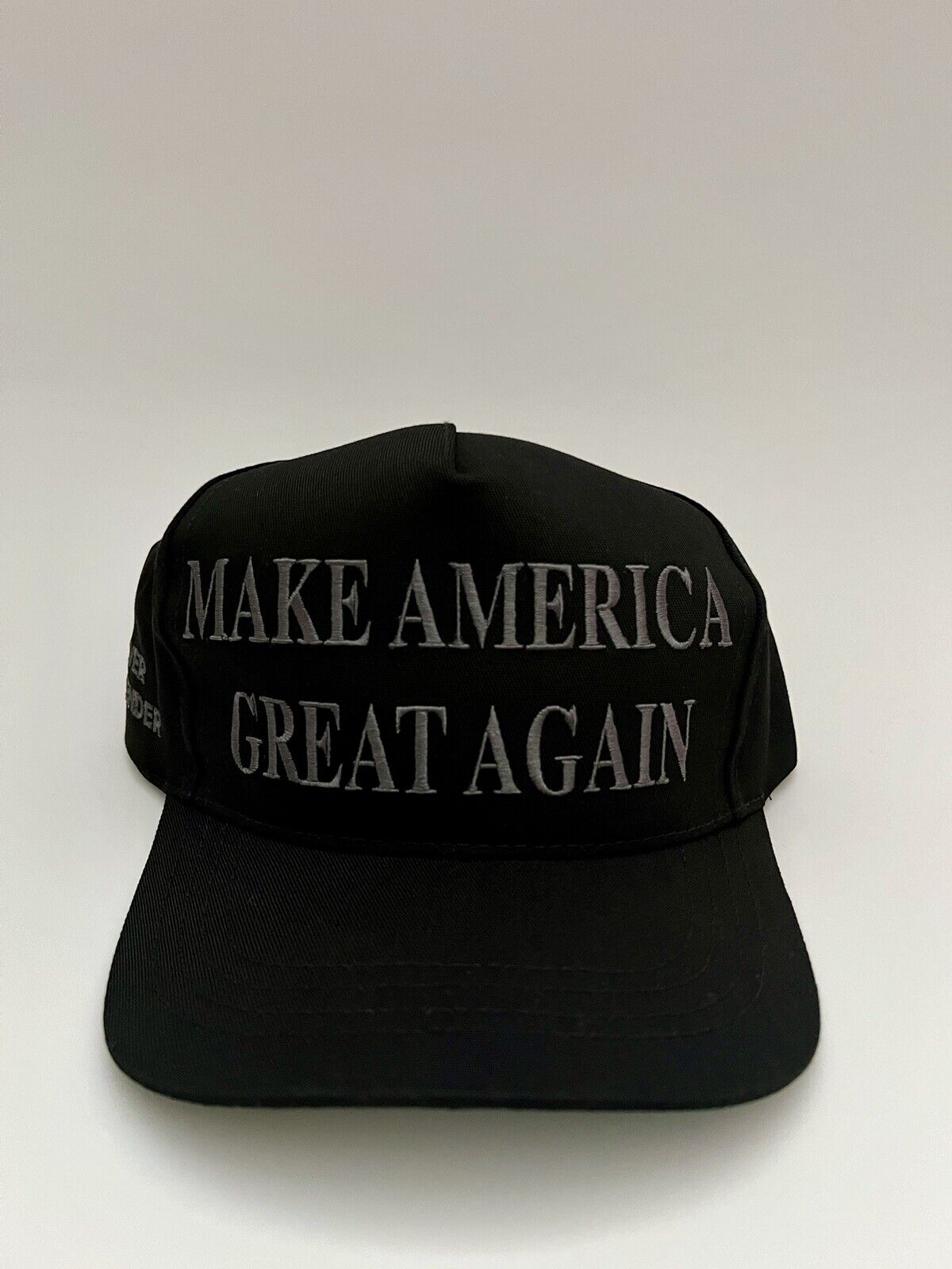 Donald Trump Official Black MAGA Hat Never Surrender Make America Great In-Hand