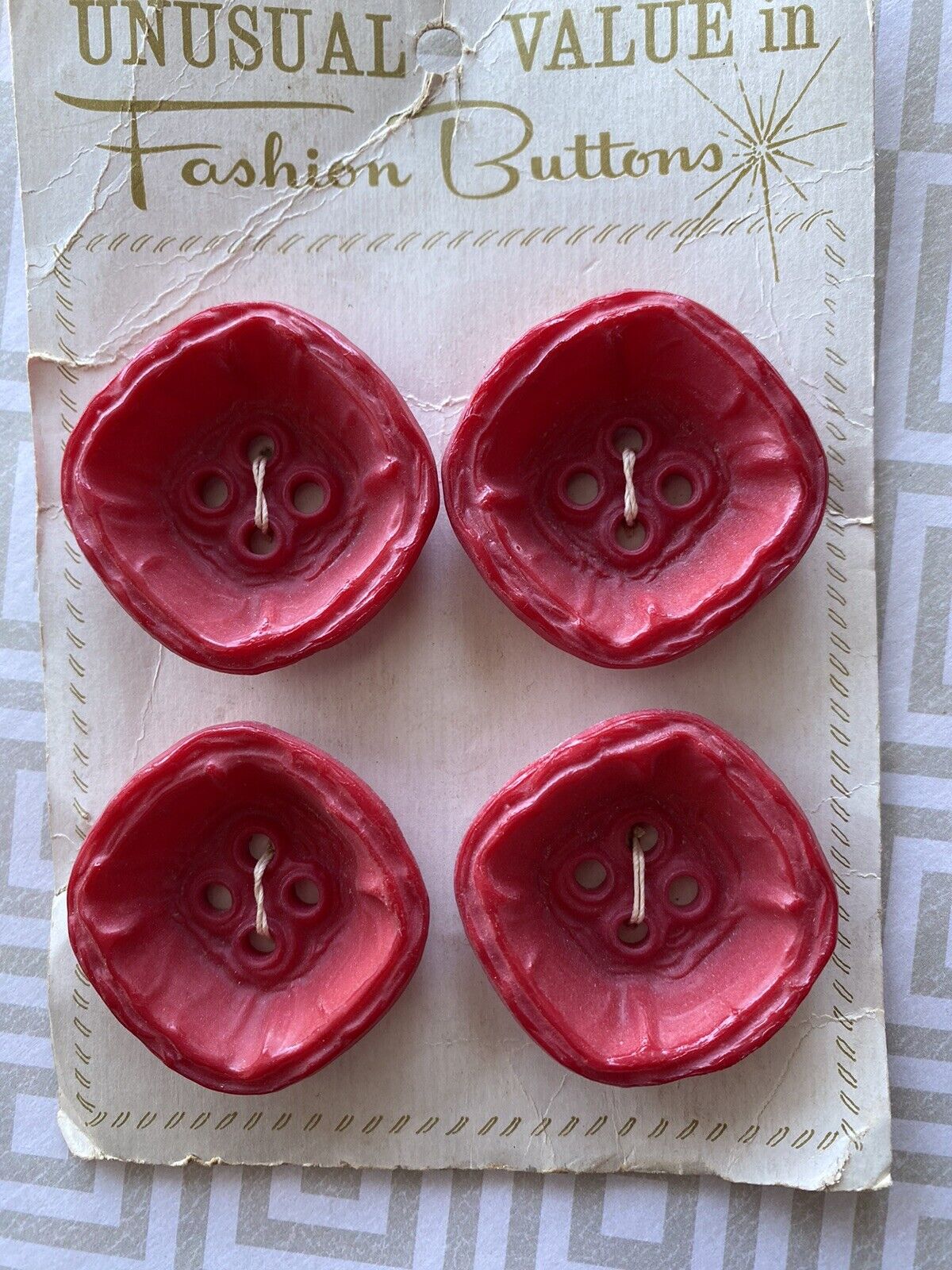 Large Funky Reddish Plastic Buttons on Card