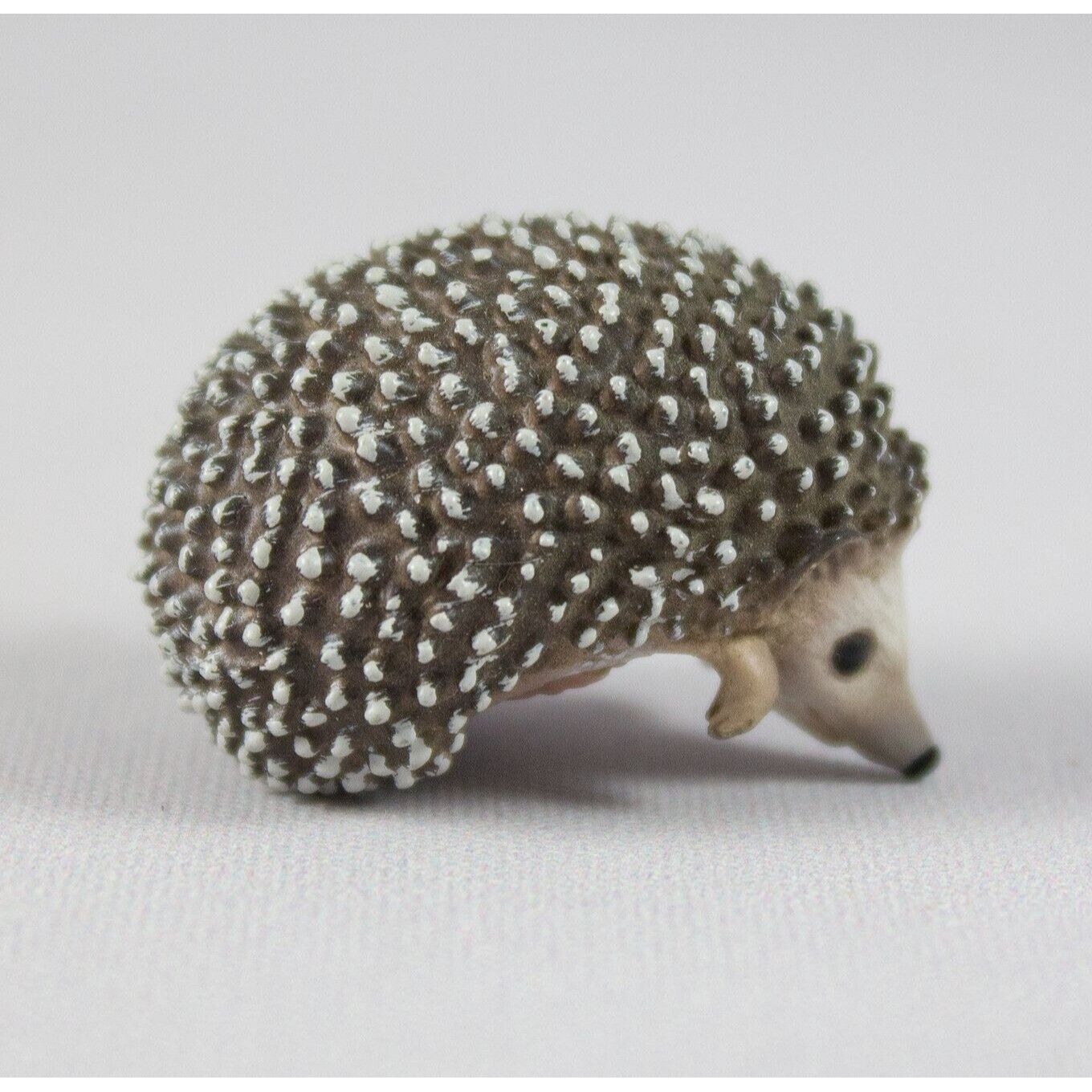 Adorable Miniature Hedgehog Figurine Hugger - Perfect Desk Buddy
