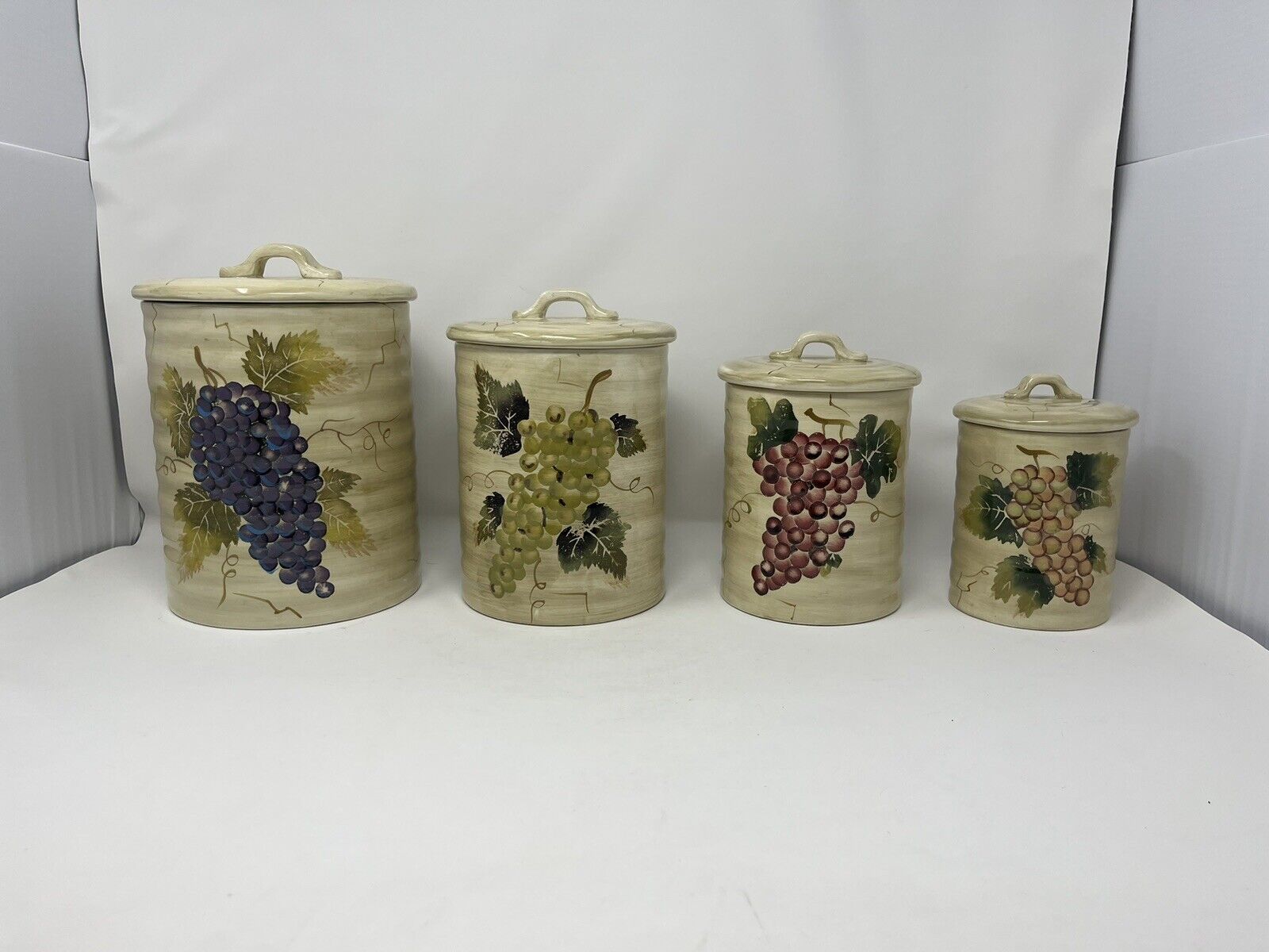 Grape Themed Ceramic Canisters Set of 4  Tabletops Gallery Cabernet EUC Rare HTF