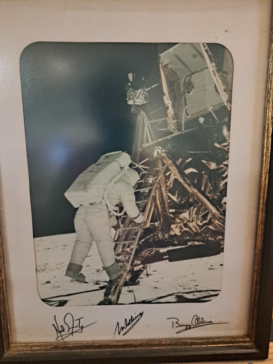 Photograph of Buzz Aldrin Climbing Out Of Apollo 11