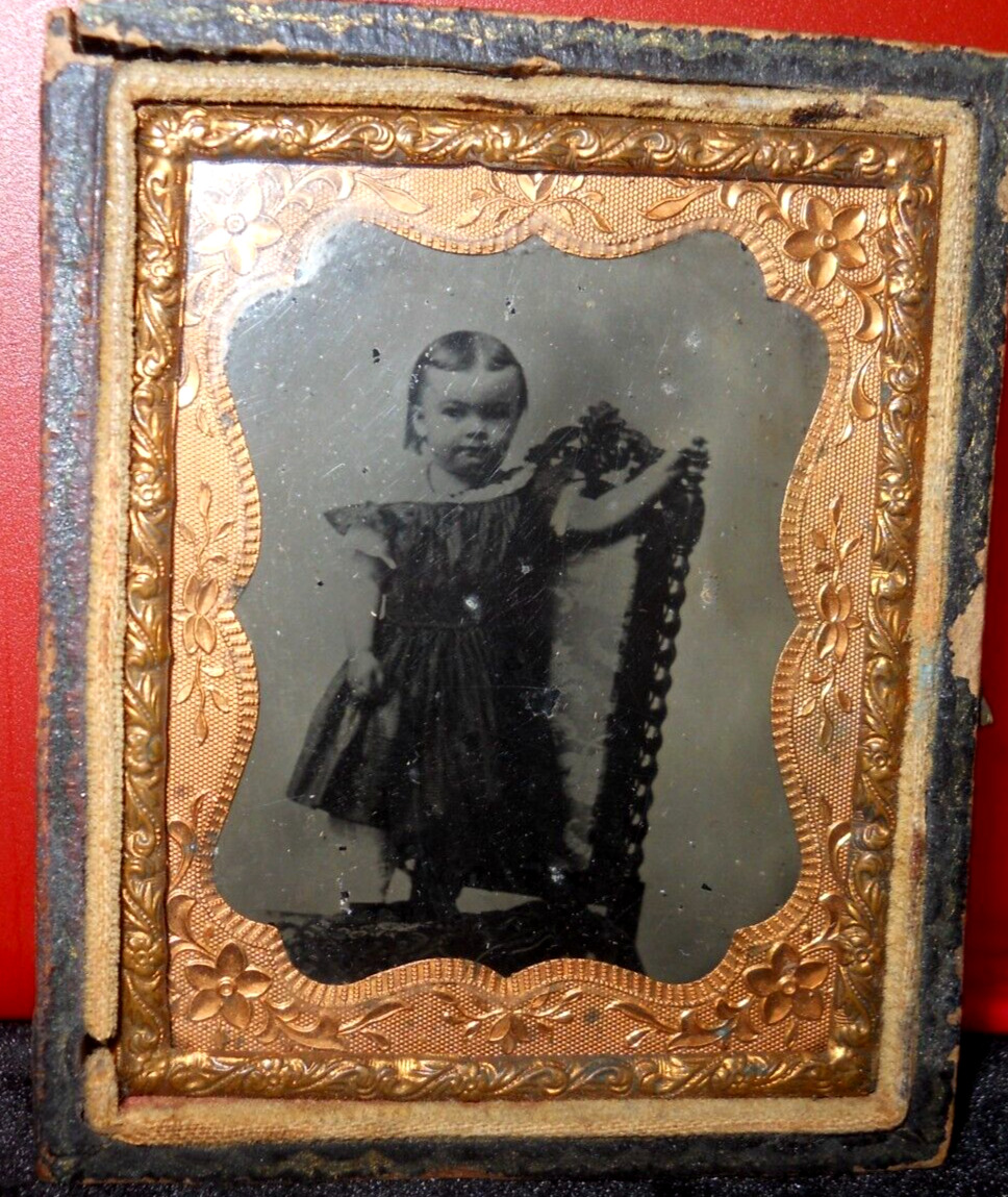 1/9th size Ambrotype of young girl on chair, half case