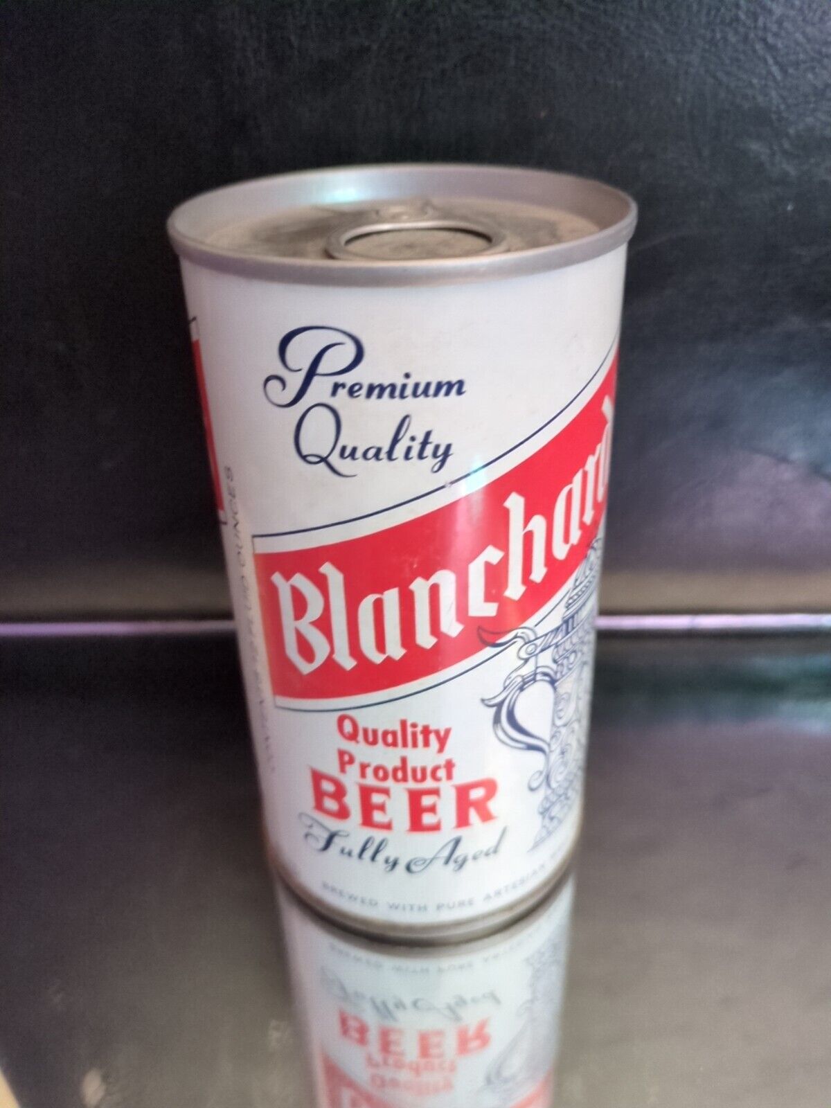 Blanchard\'s beer can, bottom opened