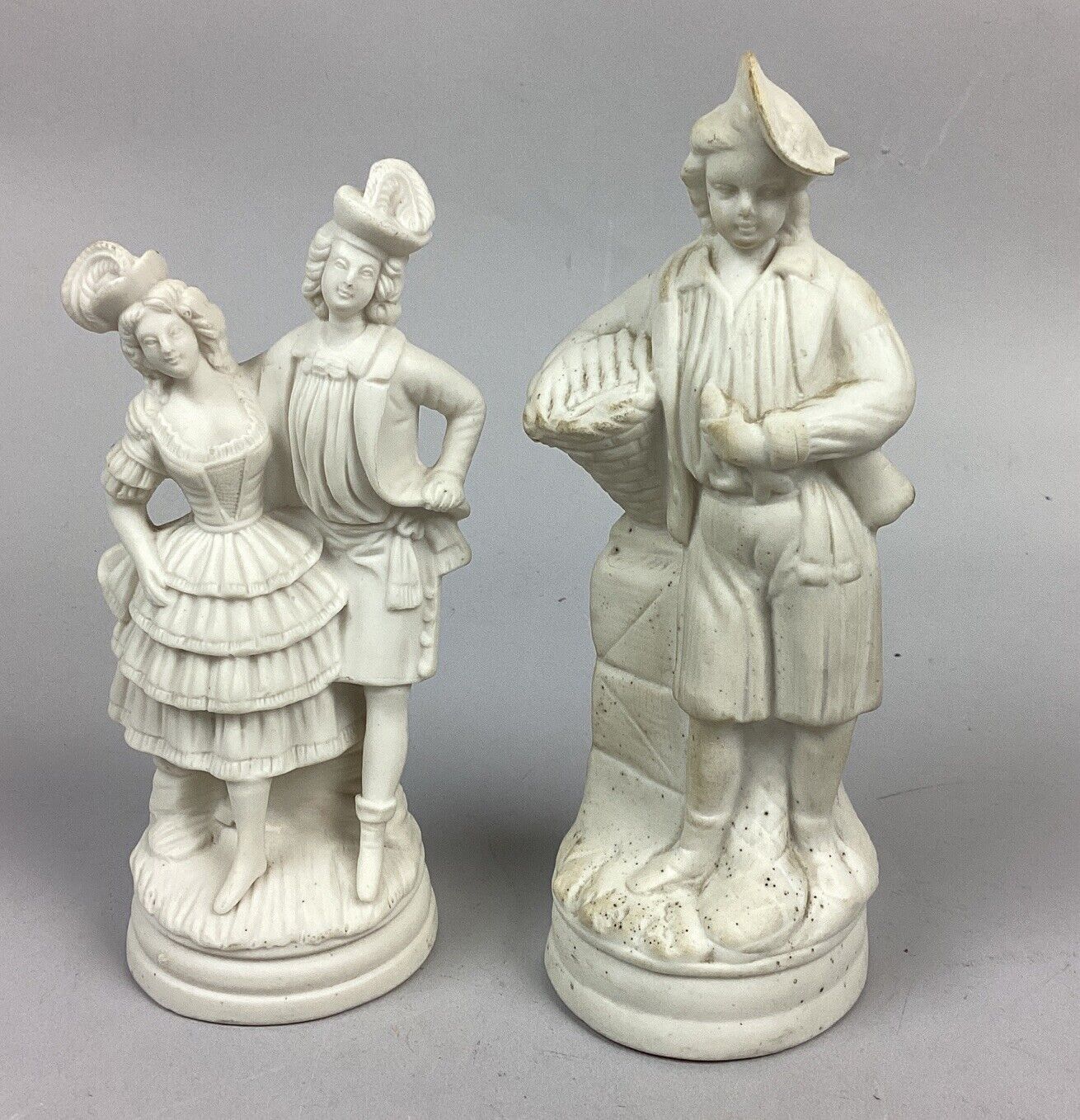 2 Antique Bisque Porcelain Figurines