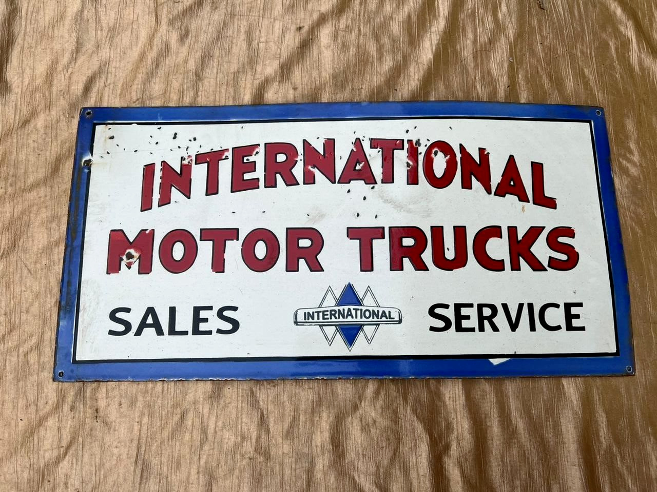 Porcelain International Motor Trucks Enamel Sign Size 24x12 Inches