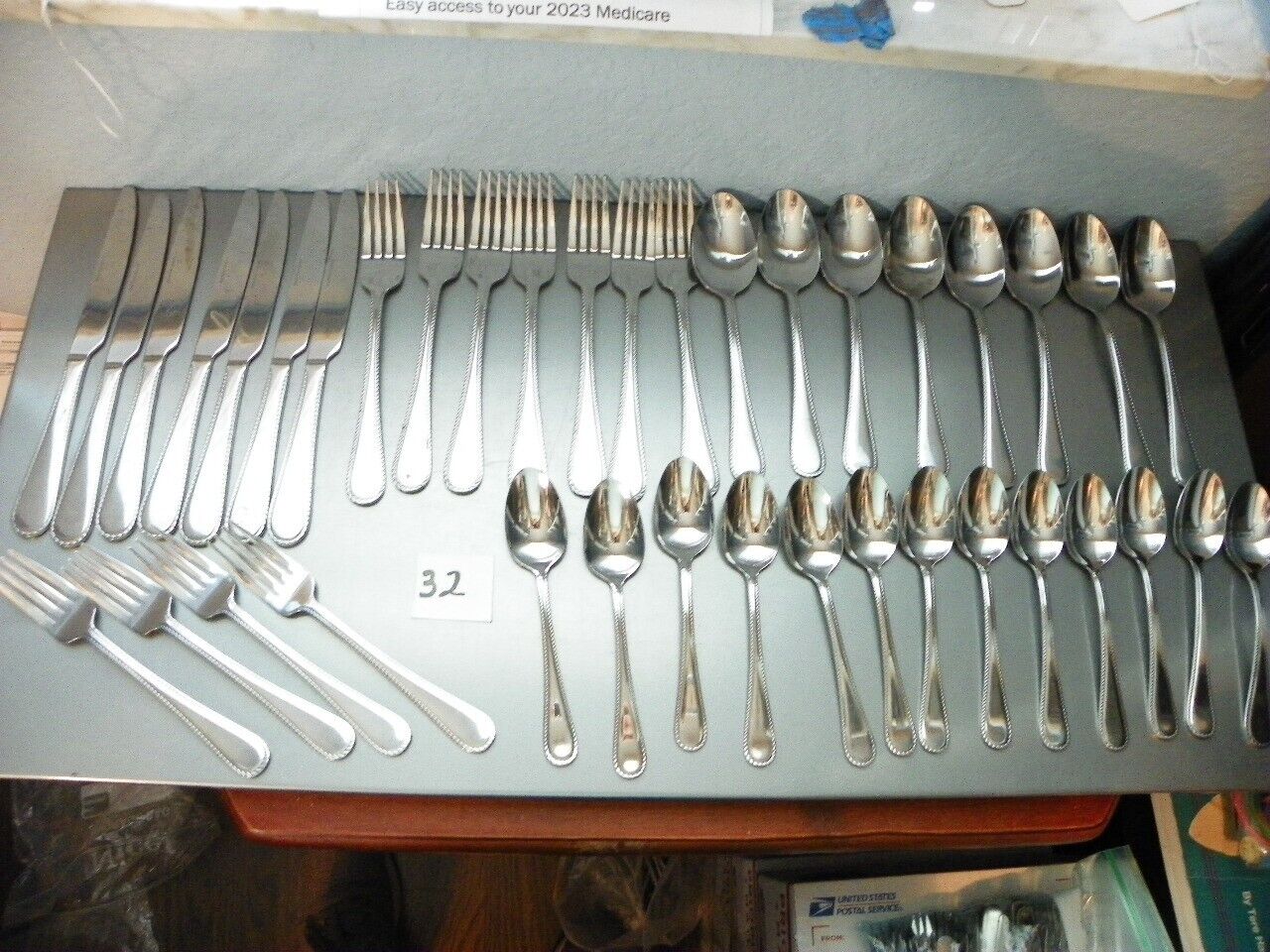 39 PIECES  INTERNATIONAL ADVENTURE STAINLESS, SPOONS,KNIVES,FORKS