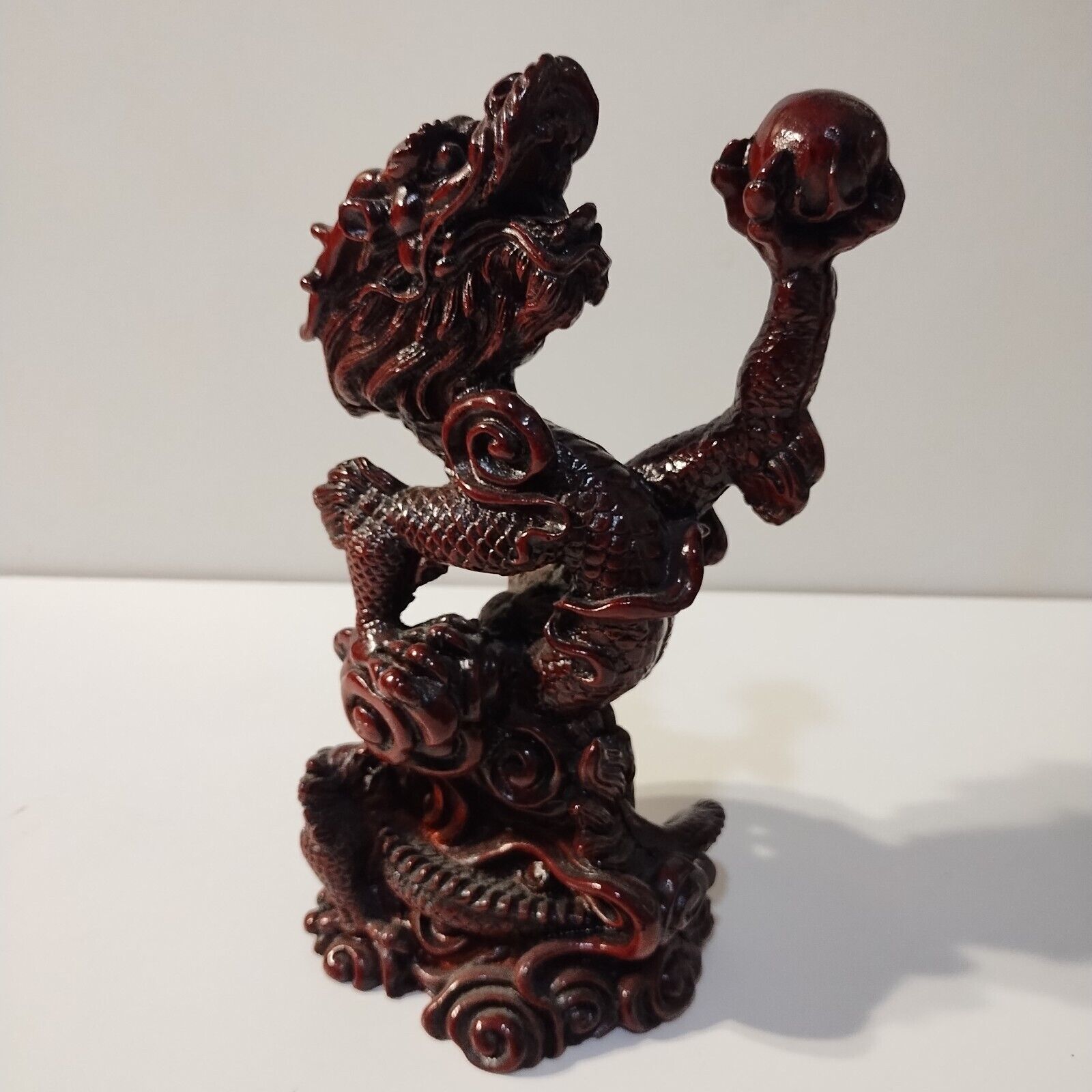 Dragon Statue Holding Orb Resin 8 inches tall
