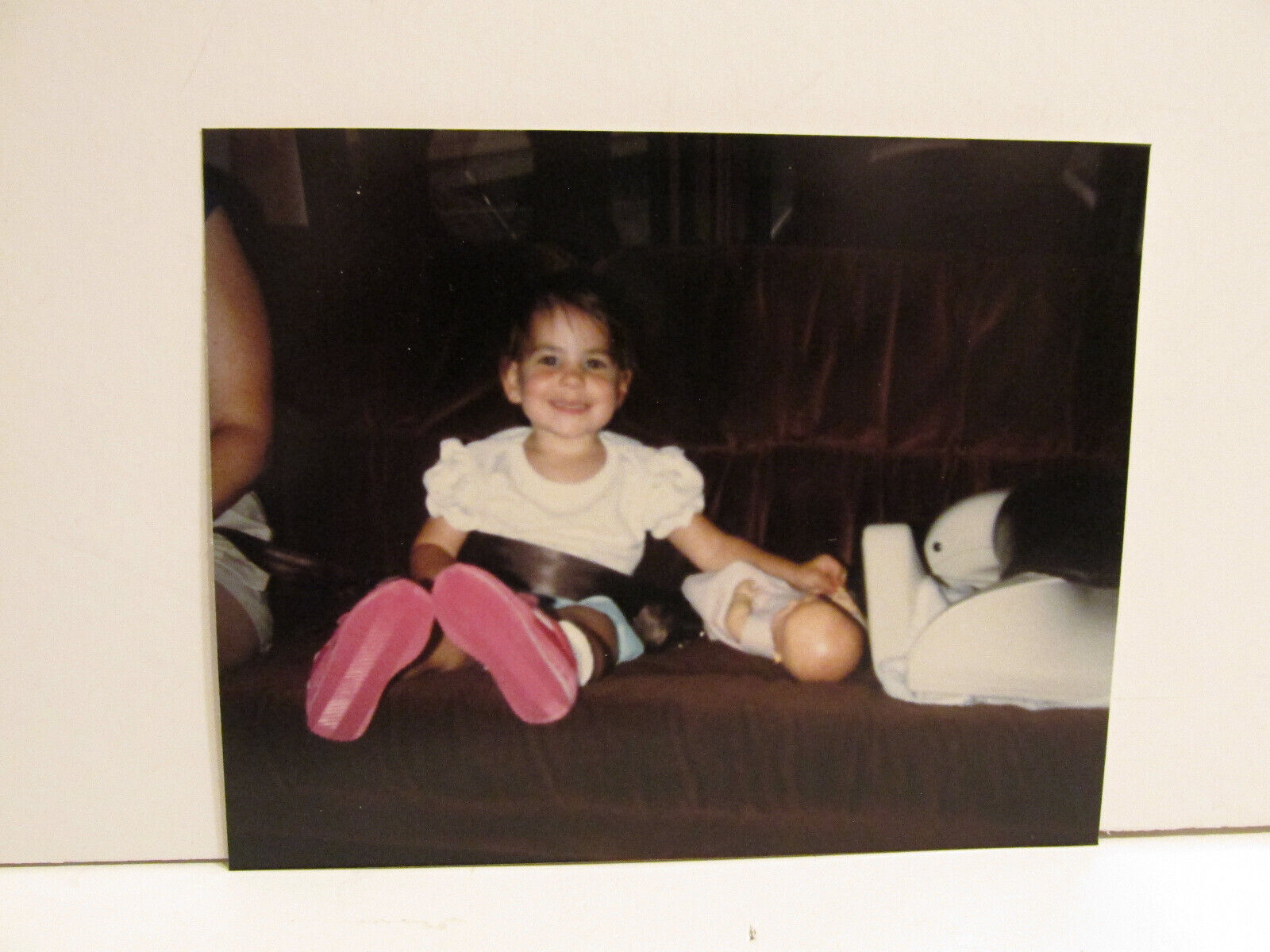 VINTAGE FOUND PHOTOGRAPH COLOR ART OLD PHOTO WHITE TODDLER GIRL SMILING ON COUCH