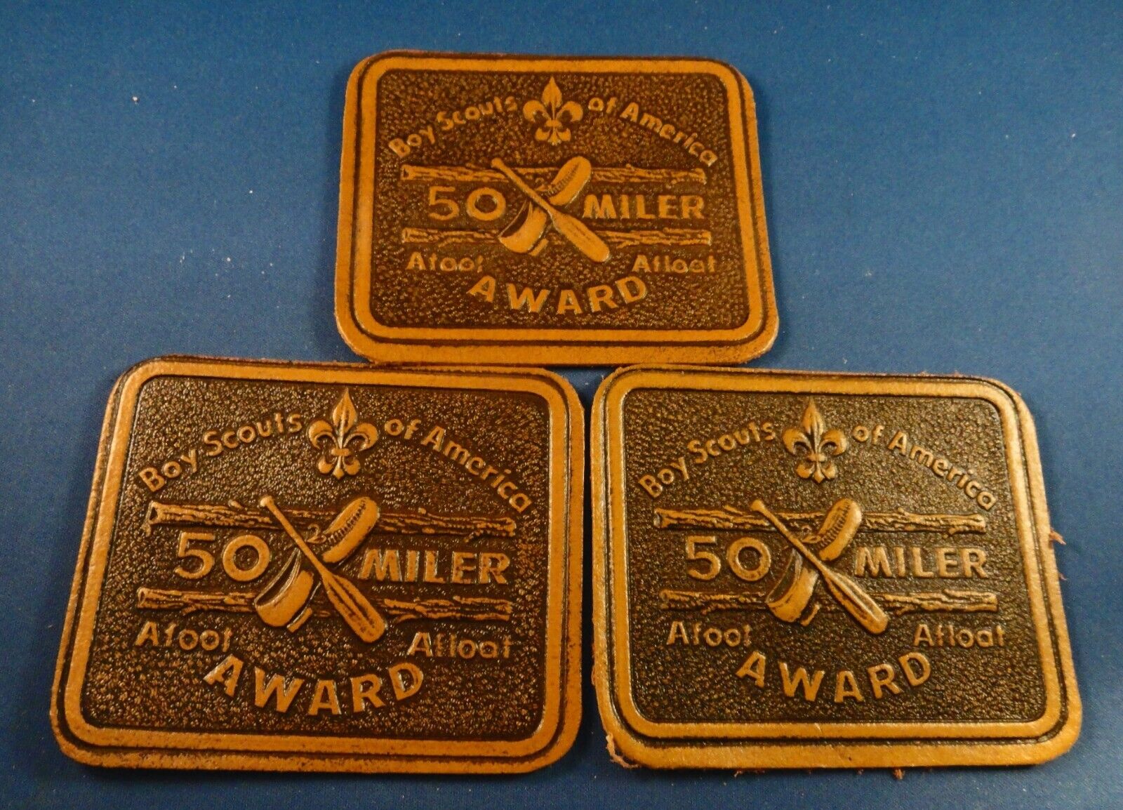 Vintage BSA National Awards: THREE Embossed Leather 50 Miler Awards - New Cond