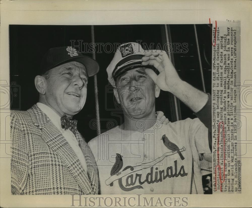 1958 Press Photo Freddie Hutchinson of Cardinals Tries on August Busch\'s Hat