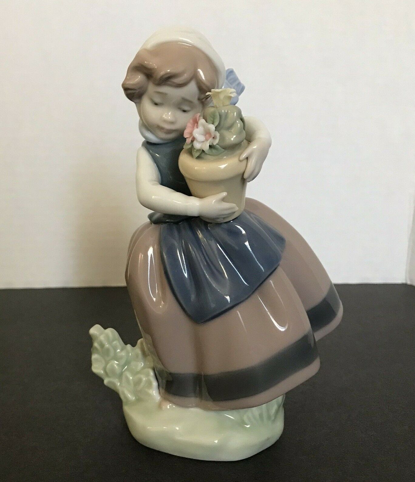 Lladro Spring is Here Girl Carrying Flower Pot Glossy Finish 6.75 in Figurine