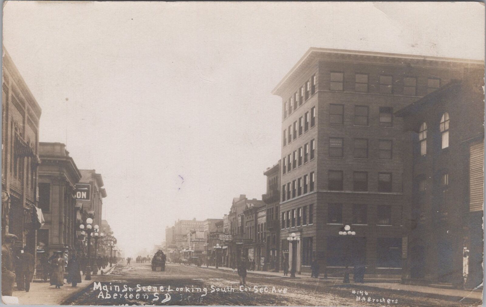 Main Street Dirt Road Stores, Aberdeen South Dakota 1910 RPPC RPO PM Postcard
