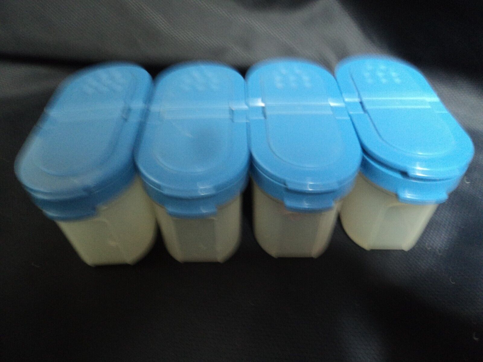 Four Vintage Tupperware Spice Shakers/Storage Containers w/Blue Lids