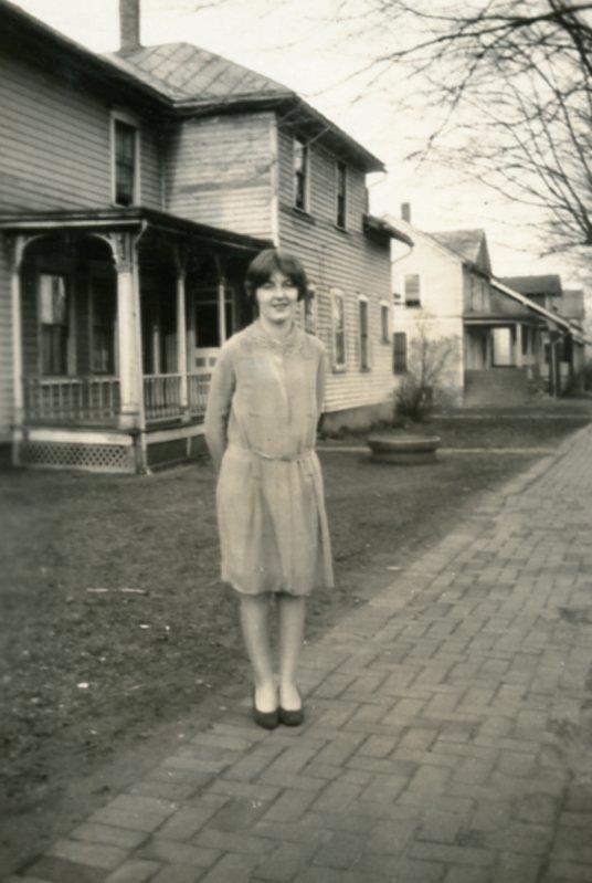YZ162 Vtg Photo YOUNG PRETTY WOMAN ON BRICK SIDEWALK, HOUSES c 1920's