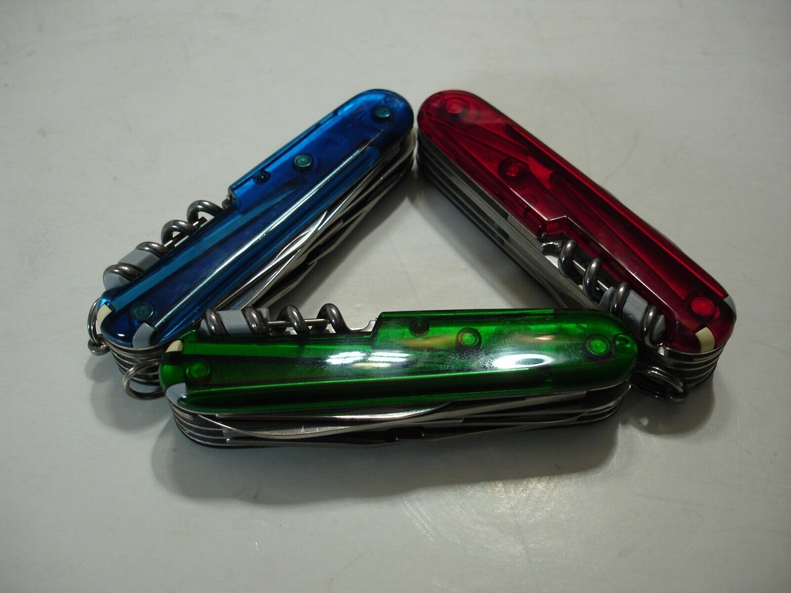 VICTORINOX lot of 3 Emerald Ruby and Sapphire HUNTSMAN PLUS\'s SWISS ARMY KNIVES