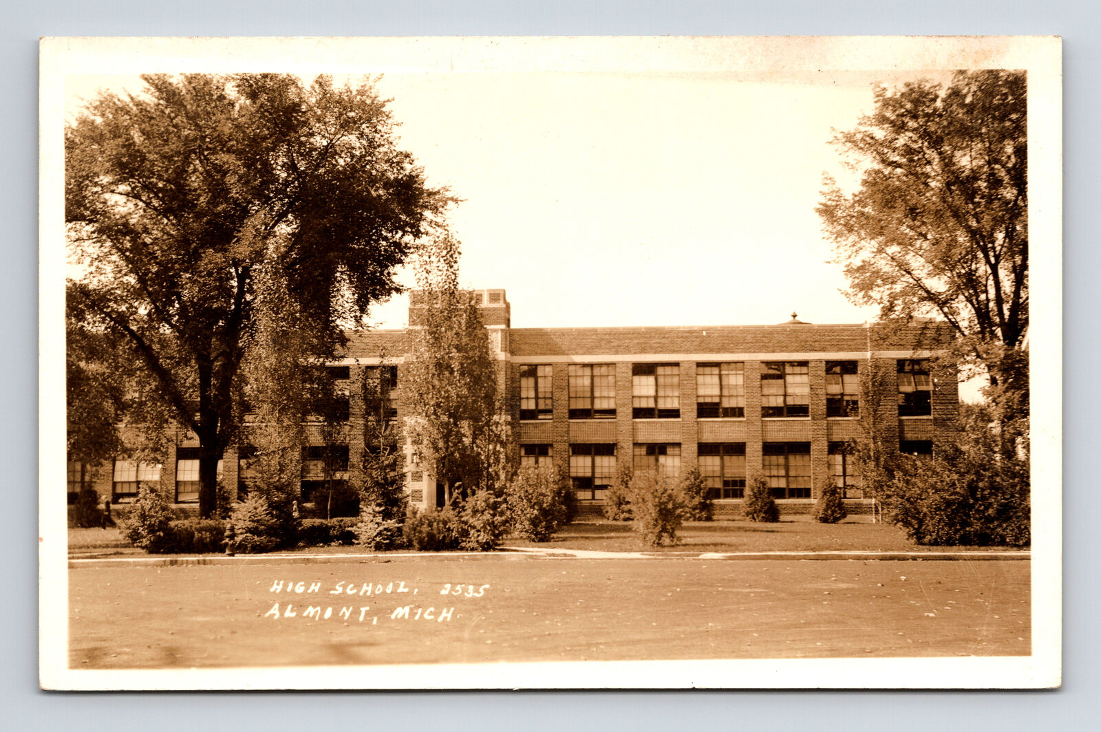 RPPC High School Building Almont MI Postcard