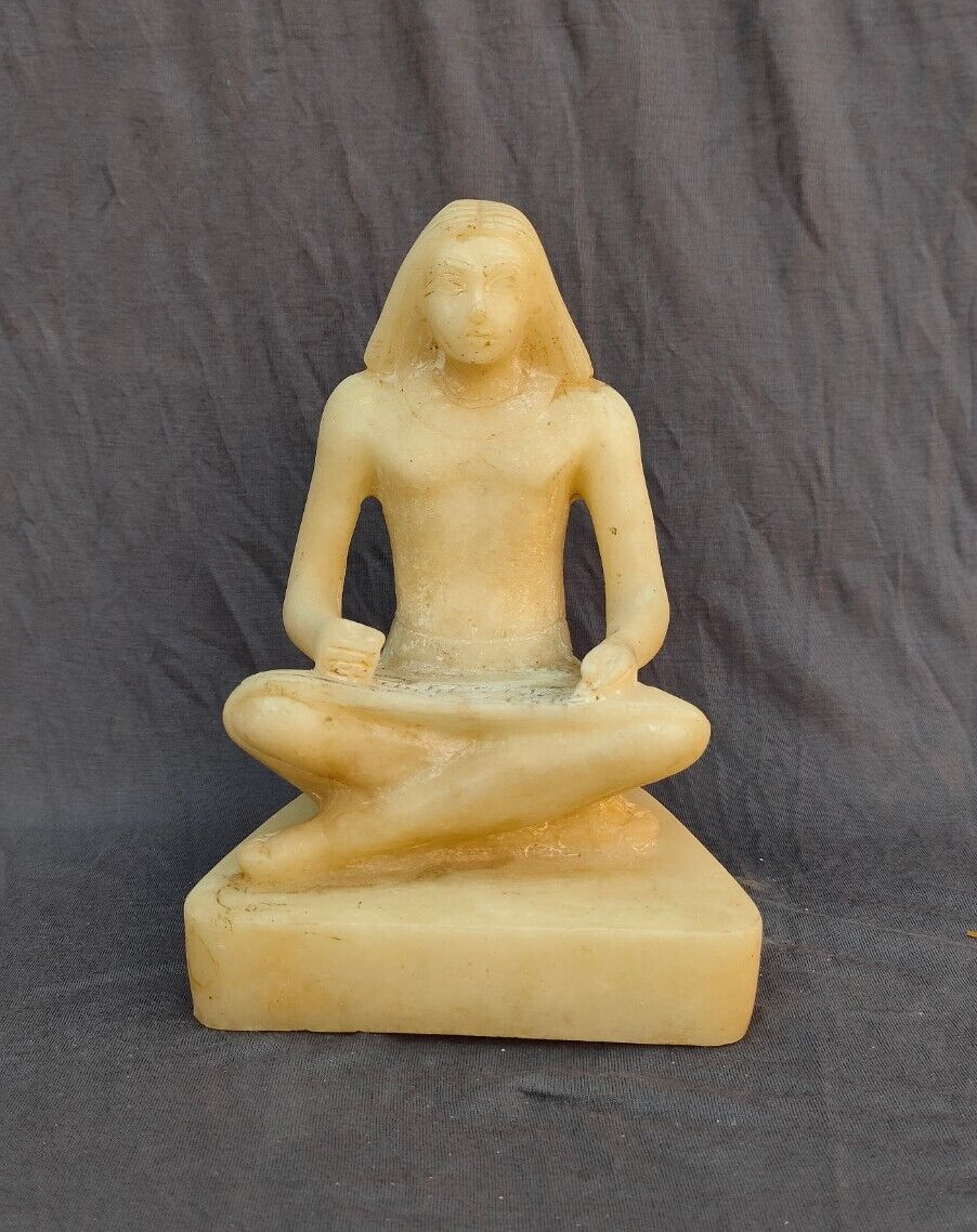 An ancient Pharaonic statue of the Egyptian writer -ancient Egyptian antiquities