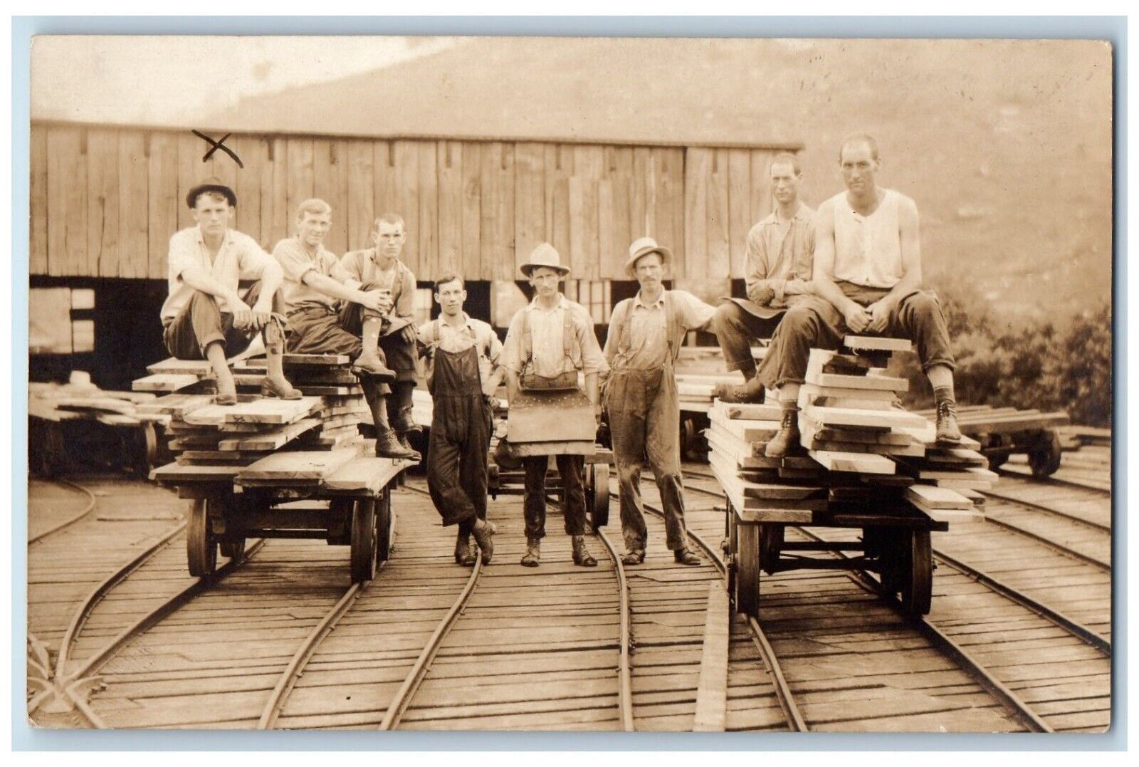c1910's Lumber Yard Piling Crew Candid Workers WV Antique RPPC Photo Postcard