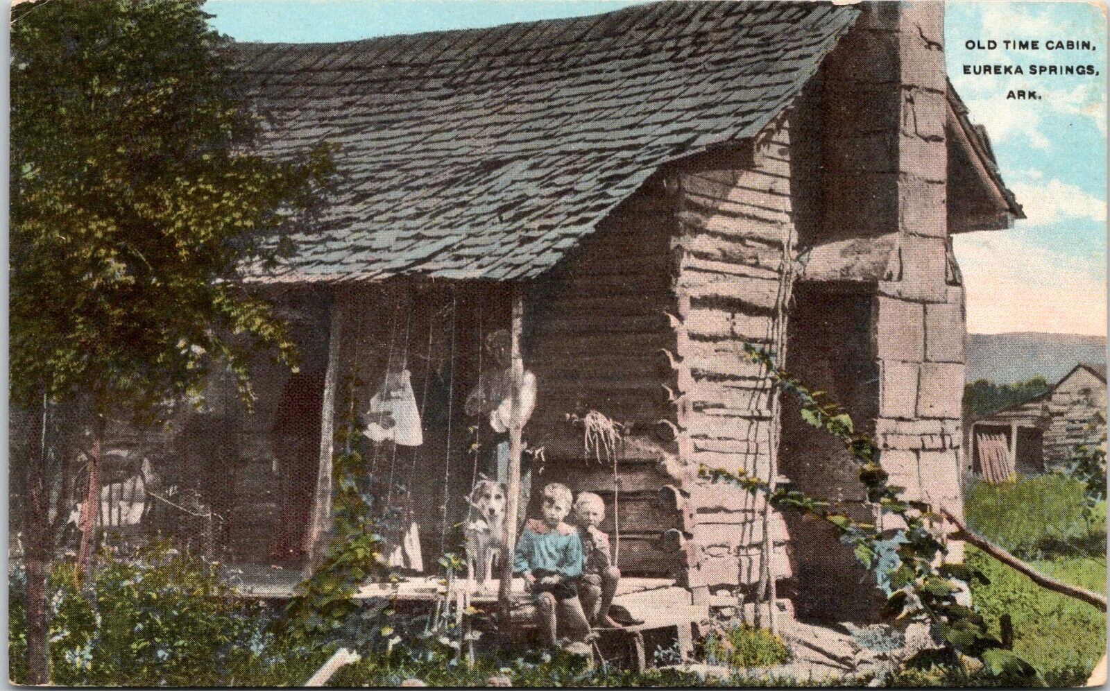 Children, Dog in Old Time Cabin Eureka Springs Arkansas- c1907-1915 d/b Postcard