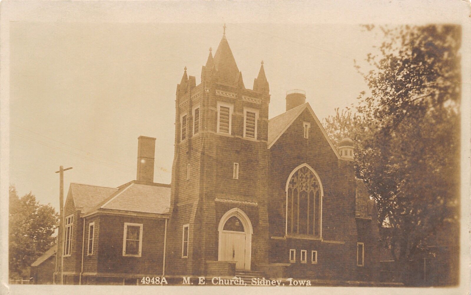 Sidney Iowa~United Methodist Episcopal Church~Corner Bell Tower Entry RPPC c1915