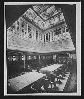 [Dining room with stained glass skylight in ocean liner or steamship]