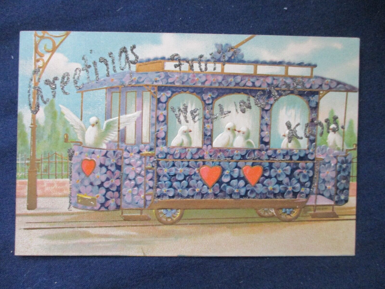 ca1910 Wellington Kansas Glitter Add-On Birds Flower Trolley Greeting Postcard