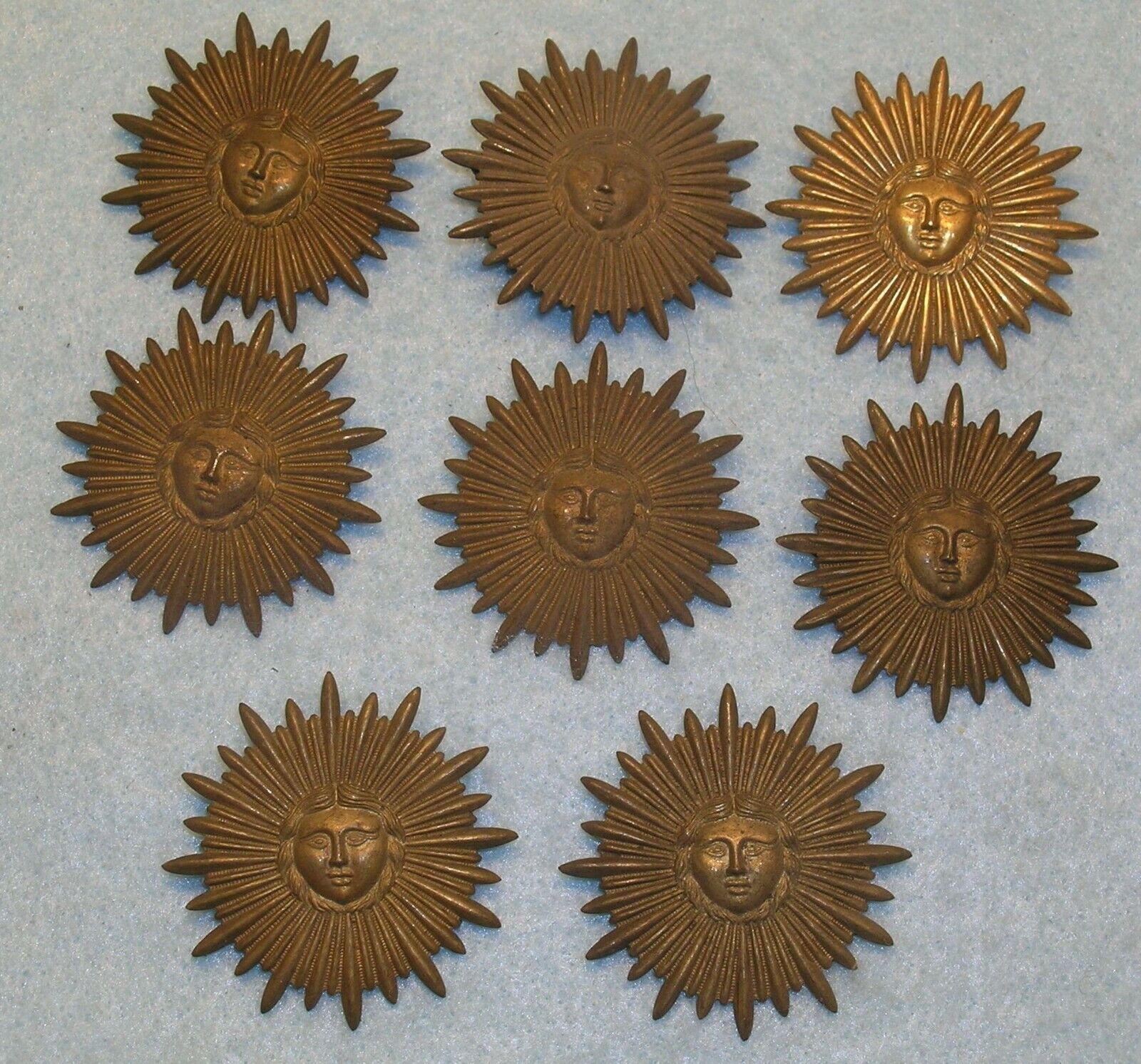 8 Antique 1.75” STAMPED BRASS SUNBURST w/ FACE New Old Stock *MC LILLEY * NOS