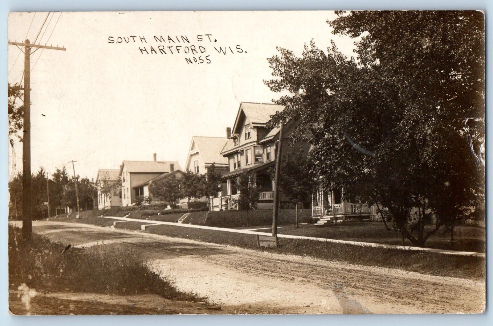Hartford Wisconsin WI Postcard RPPC Photo South Main Street Dirt Road Houses