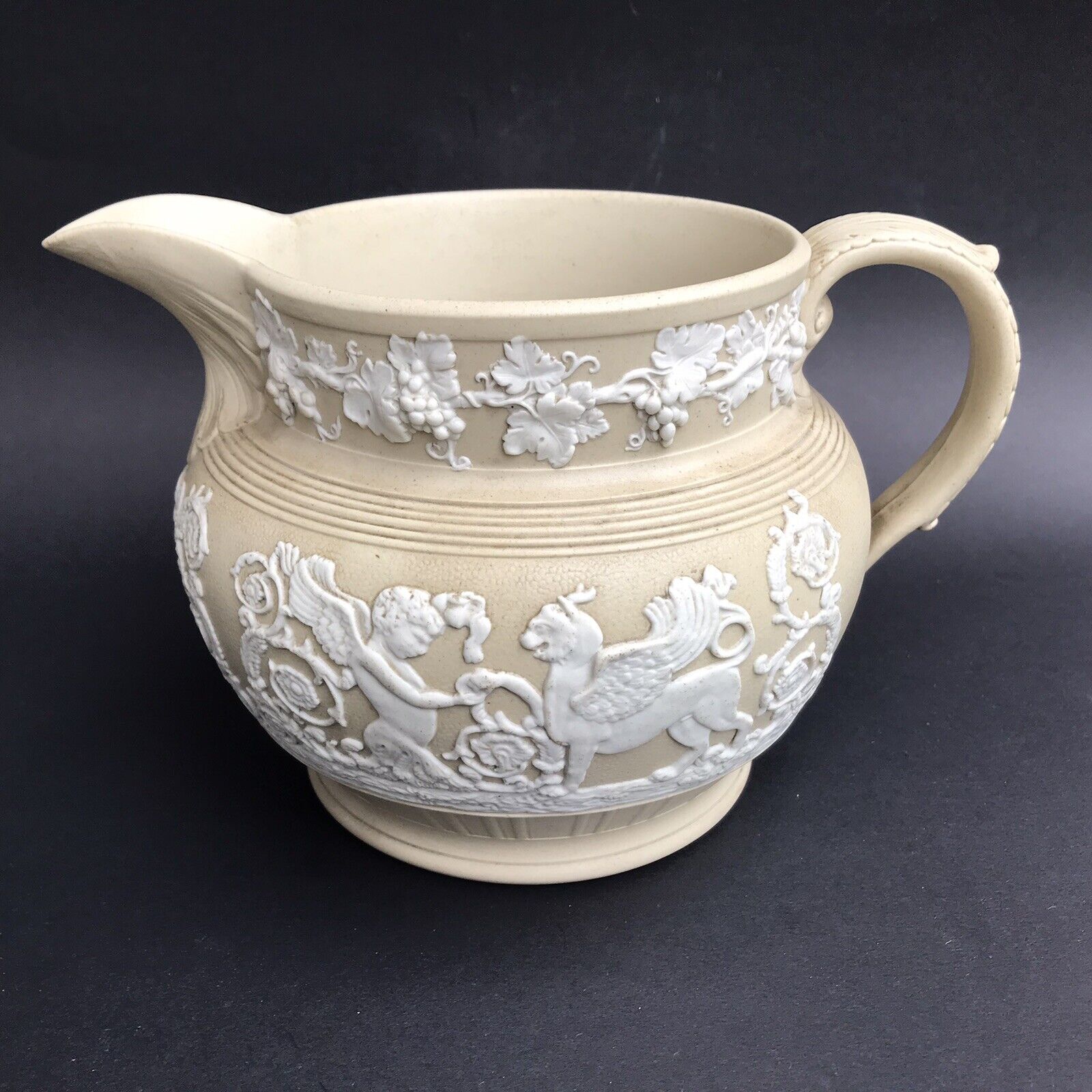 antique drabware jug 1800s grapevine angel griffin relief smear glaze Clews?