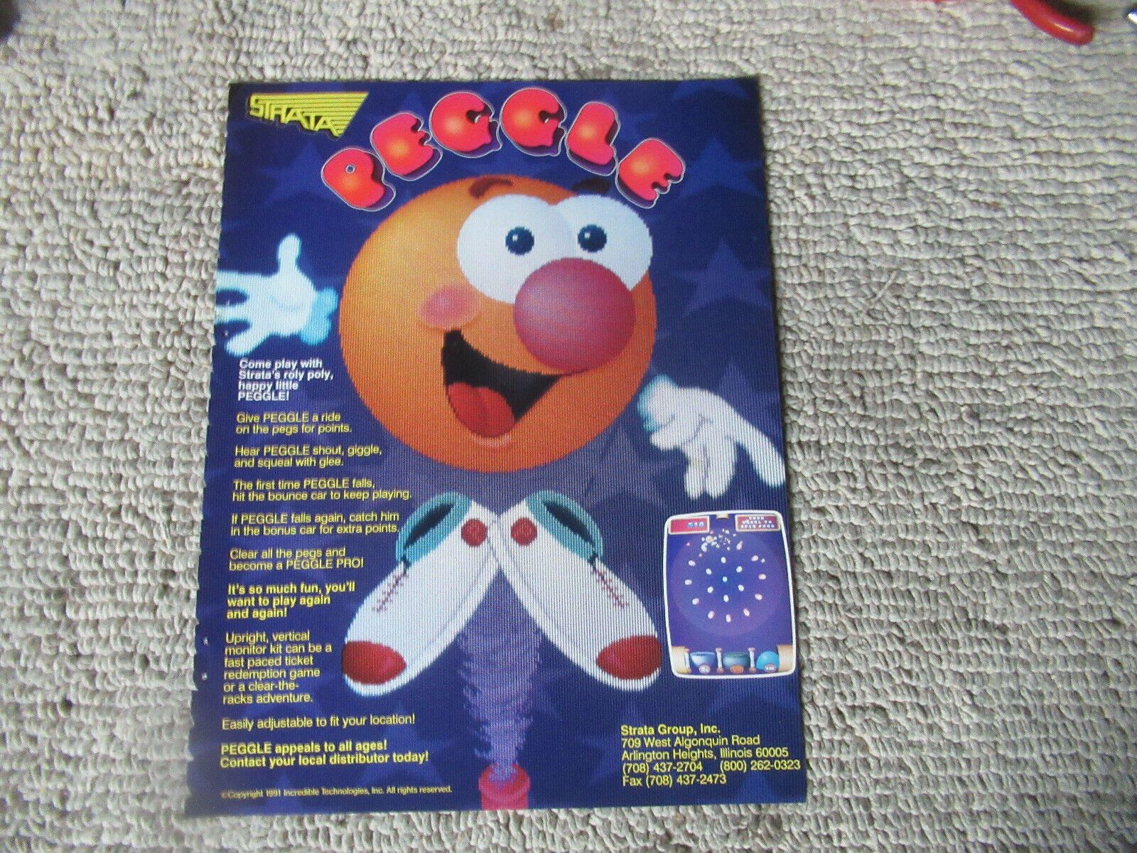 original 1991  11- 8.5\'\'  PEGGLE  STRATA  arcade video game AD FLYER    