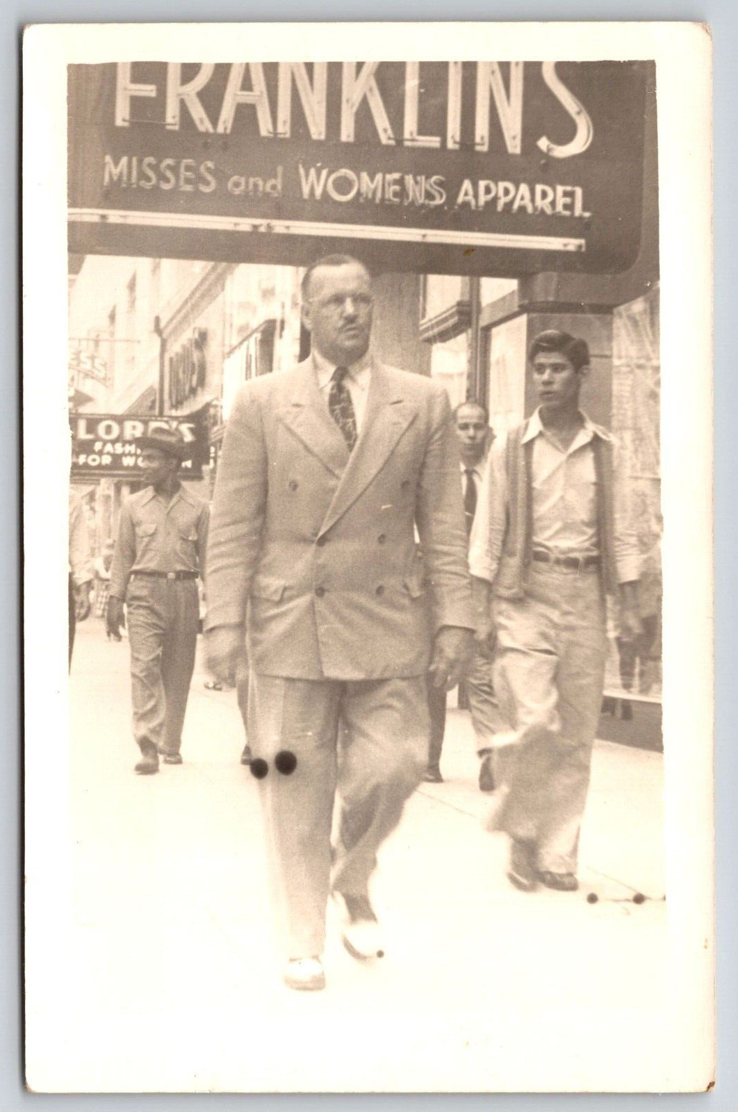 RPPC Busy Street Man Walking Franklins Apparel Vintage Card