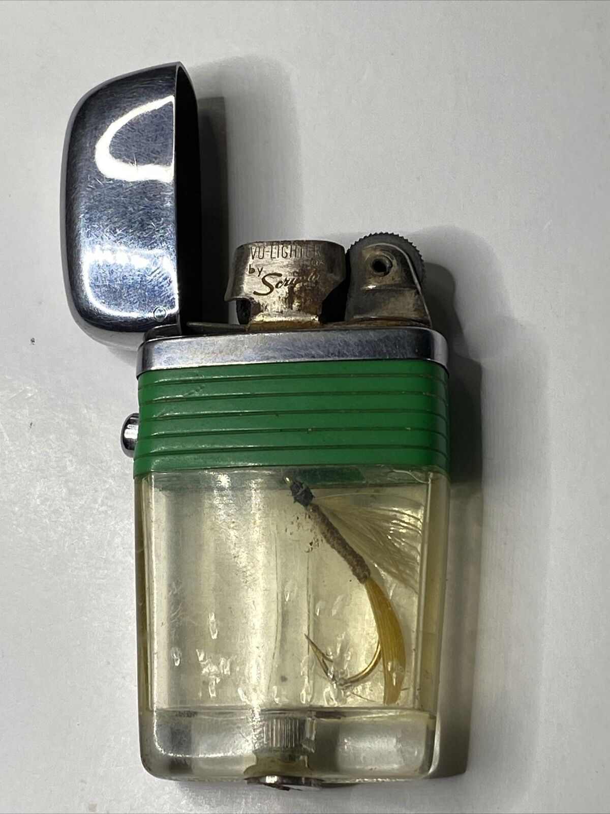 Scripto vintage Vu-Lighter with fly fishing lure Green & Clear