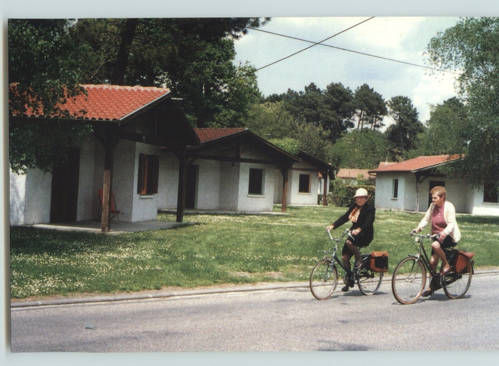 Postcard: Elderly Women on Bicycles - Houeilles, France