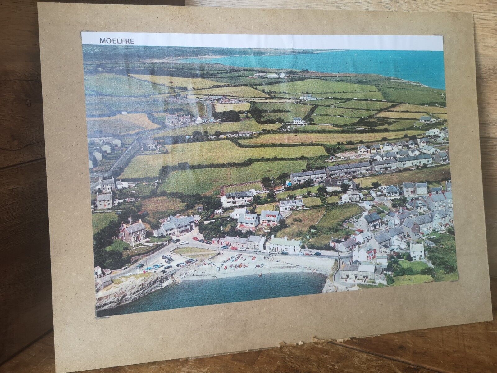 AERIAL PHOTOGRAPH OF MOELFRE, ANGLESEY ( real picture mounted on board). 