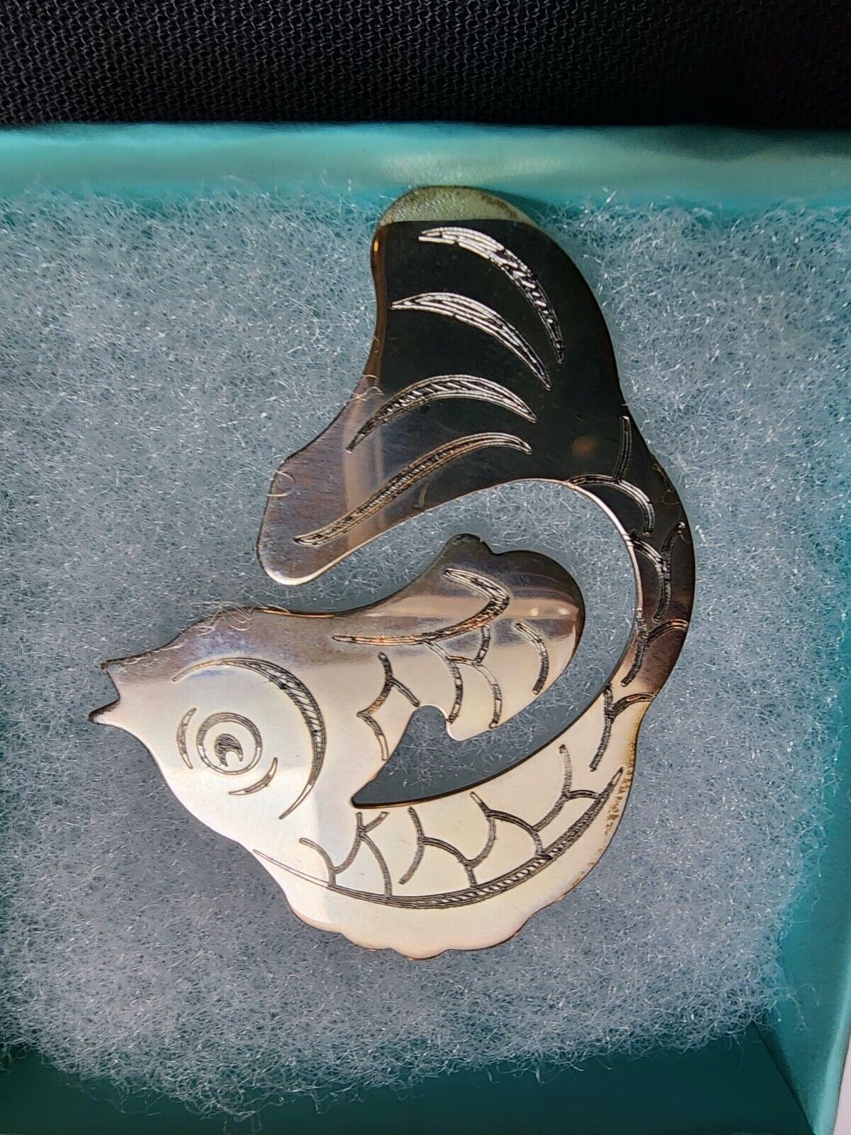 Tiffany co. sterling Silver Fish book mark .Never used .It' in a original pouch.