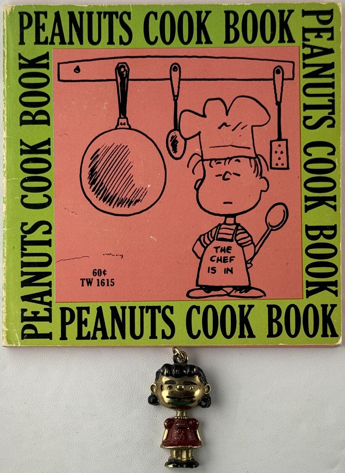Vintage U.F.S. Metal PEANUTS LUCY Pendant/ Keychain & 1970 Cook book Schulz
