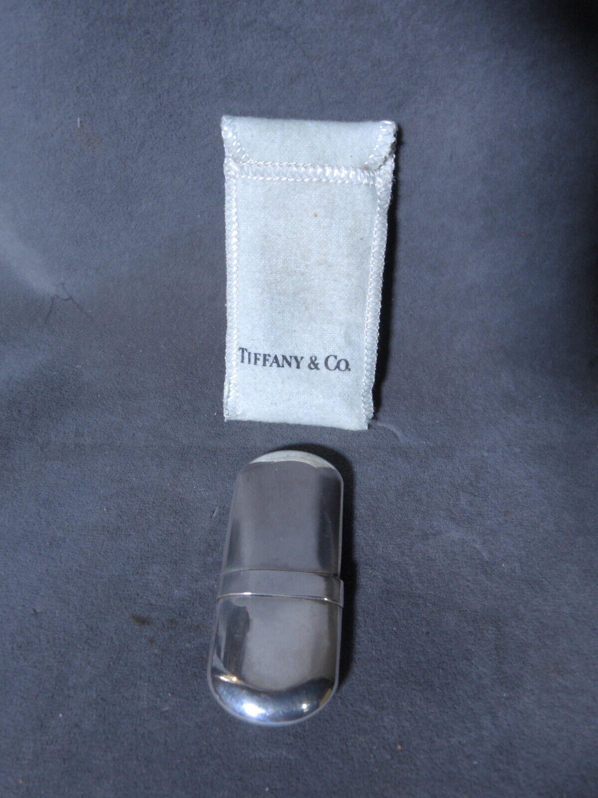 Silver Lighter with Tiffany & Co. Little Blue Bag, Elsa Peretti Bean?