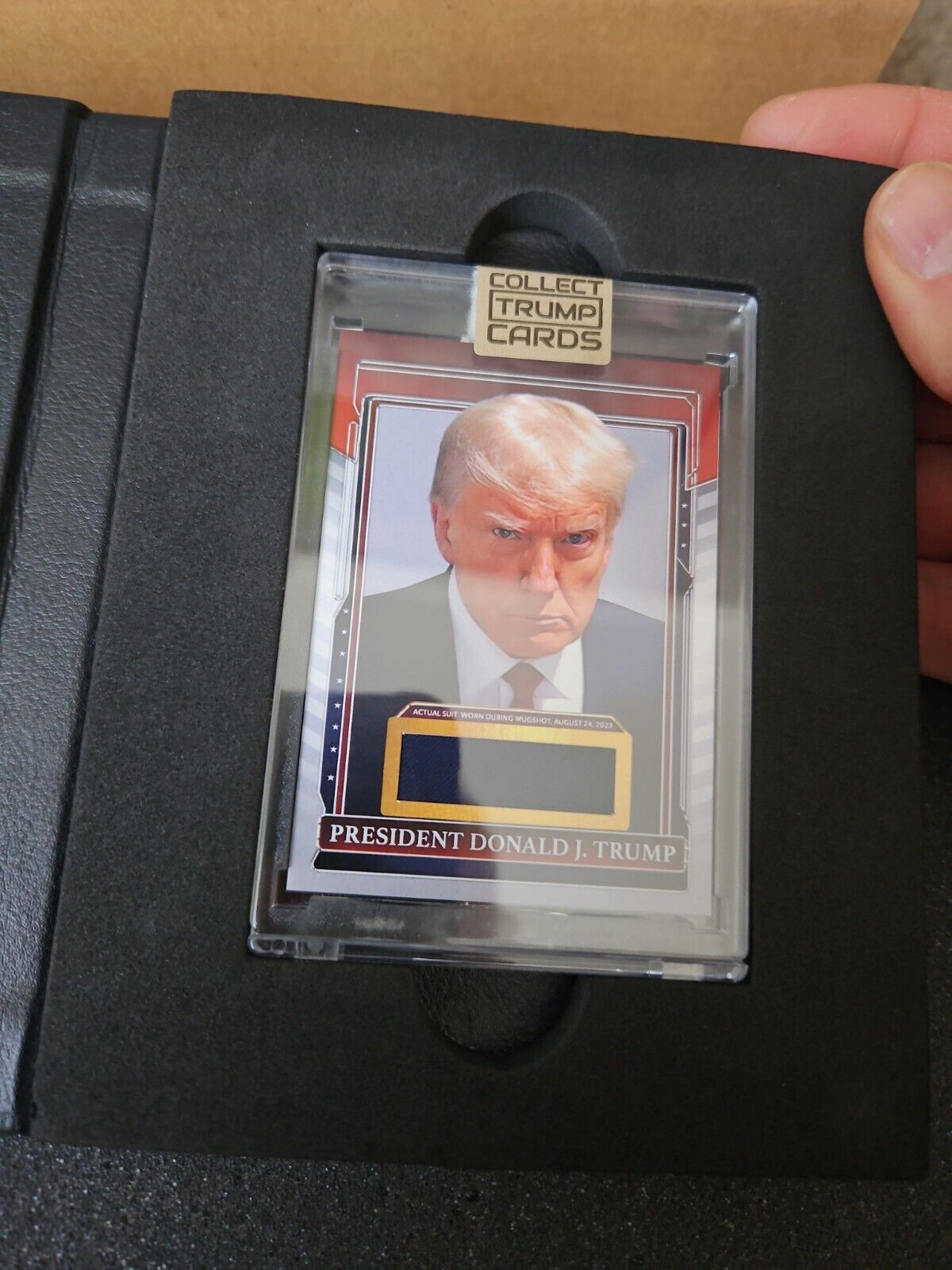 Trump Official Physical Trading Card w/Piece of President Suit MuhShot (READ)