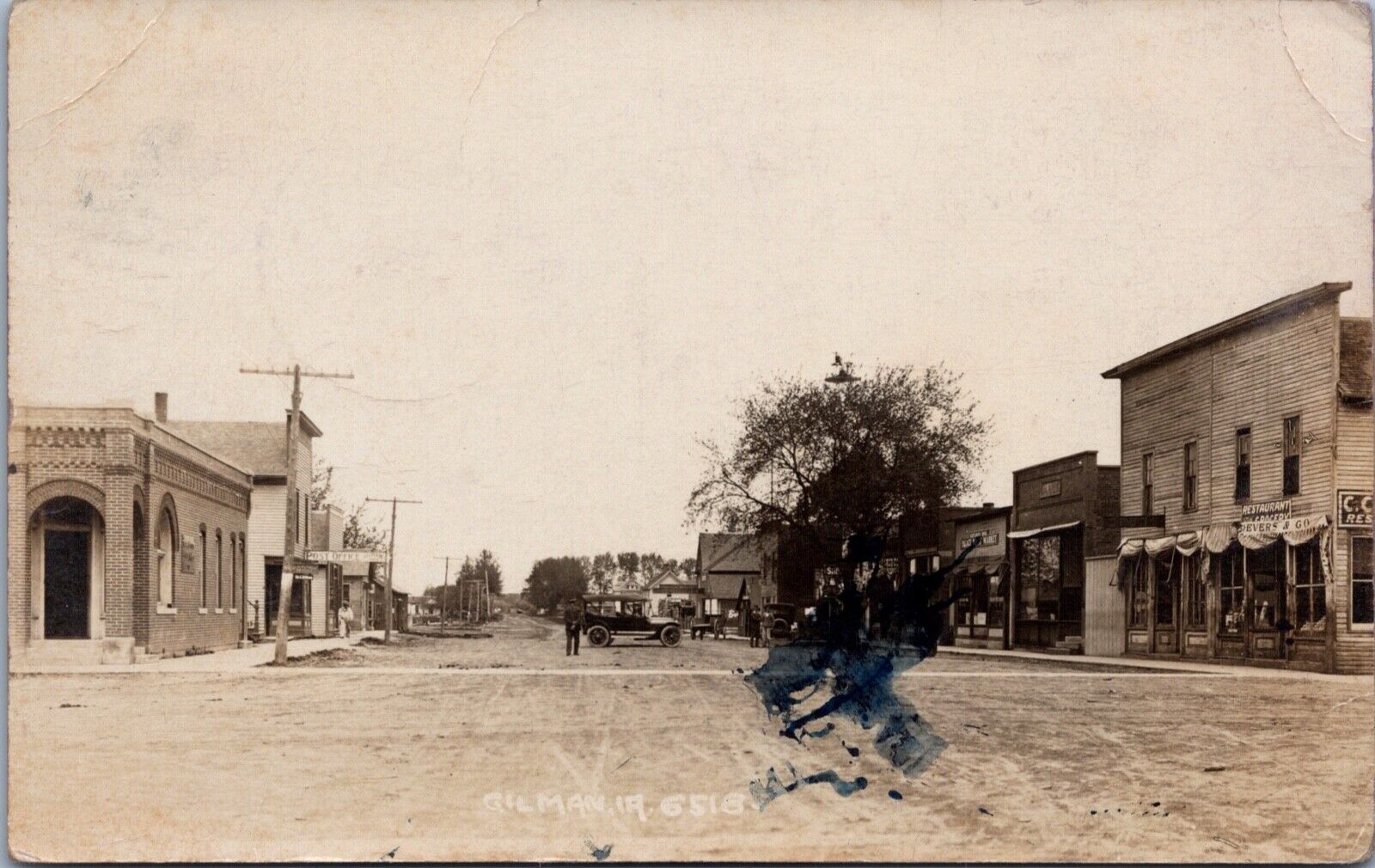 Postcard c1918 RPCC Gilman, Iowa Street View Of Town  #D10