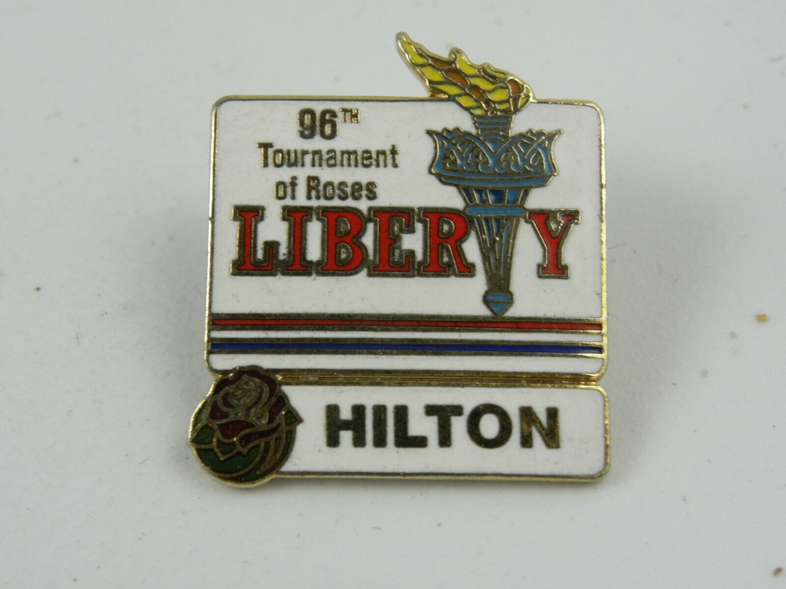Vintage Tournament of Roses Pin Hilton Sponsor Enamel Torch Liberty