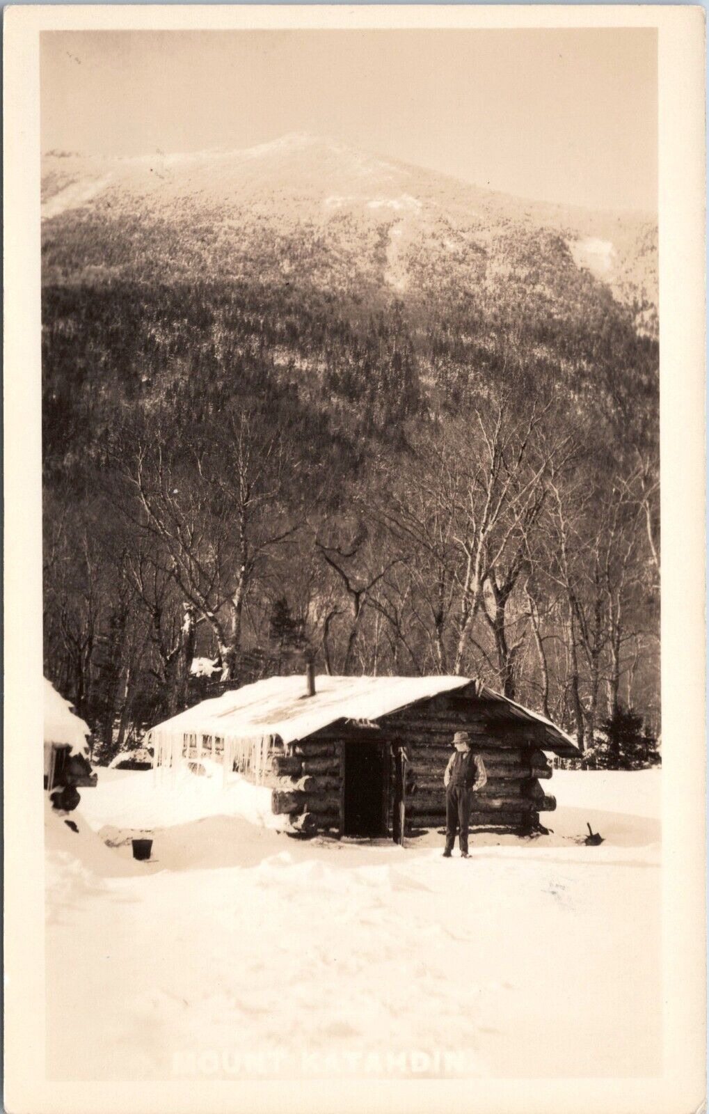 RPPC Man next to Log Cabin below Mount Katahdin, Maine - c1920s Photo Postcard