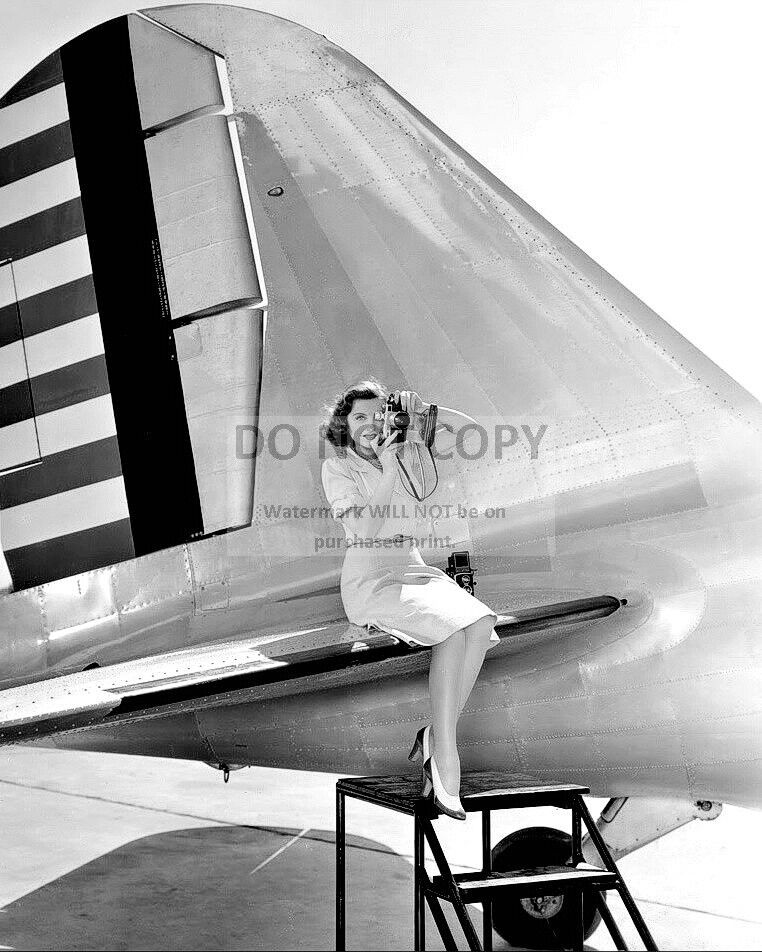 ACTRESS CONSTANCE MOORE ON AN AIRPLANE WING WITH A CAMERA - 8X10 PHOTO (FB-175)