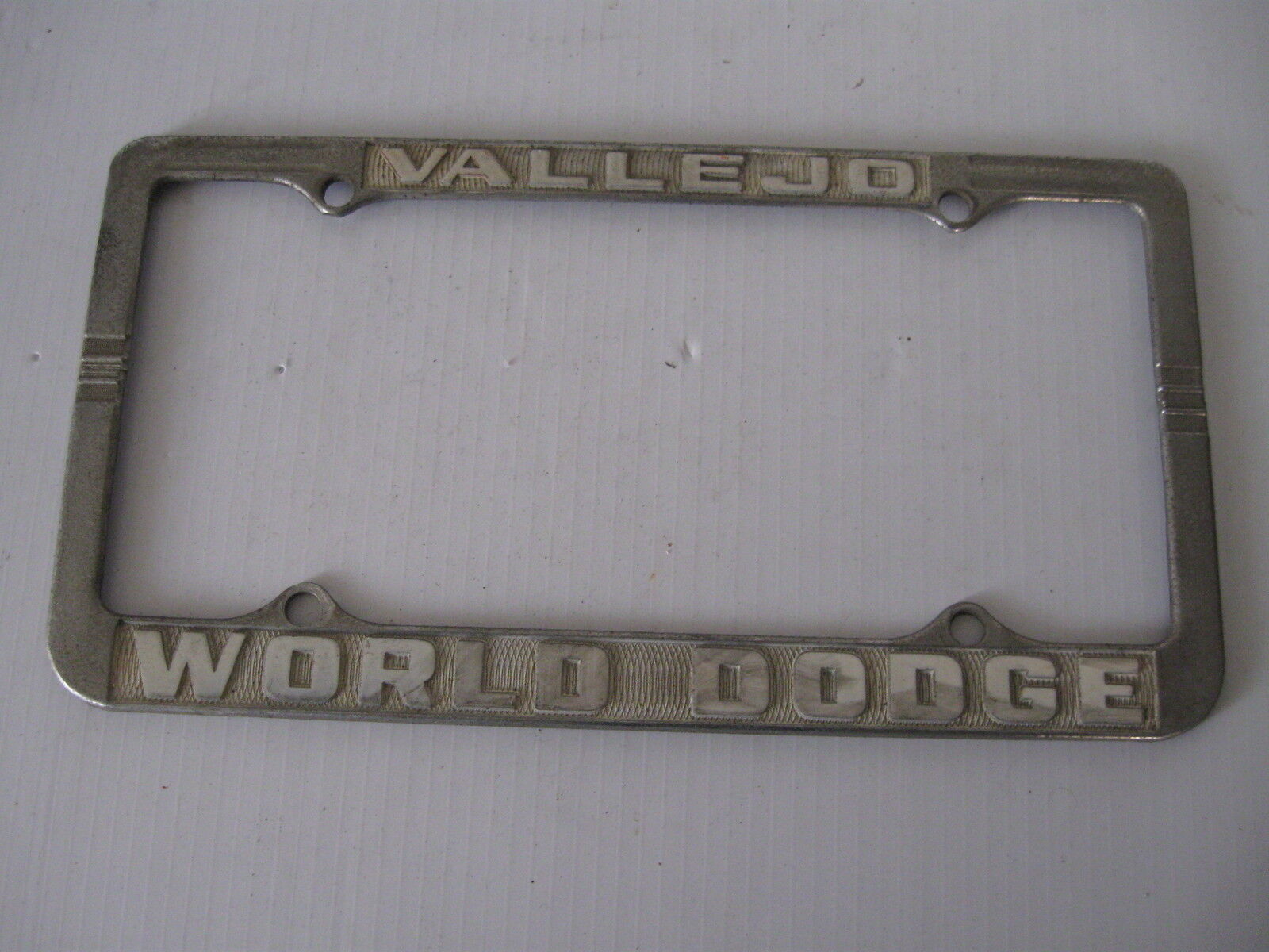 Vintage Vallejo CA 1950s Dodge Metal Embossed Tag Holder License Plate Frame