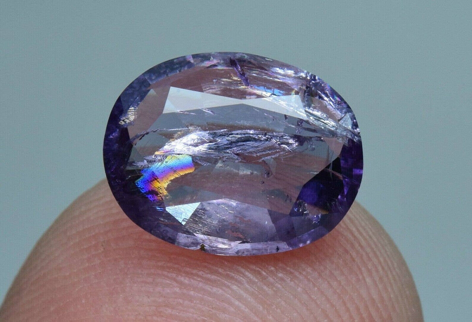 Beautiful Oval Faceted Fluorescent Purple Scapolite Gemstone 1.70 Carat