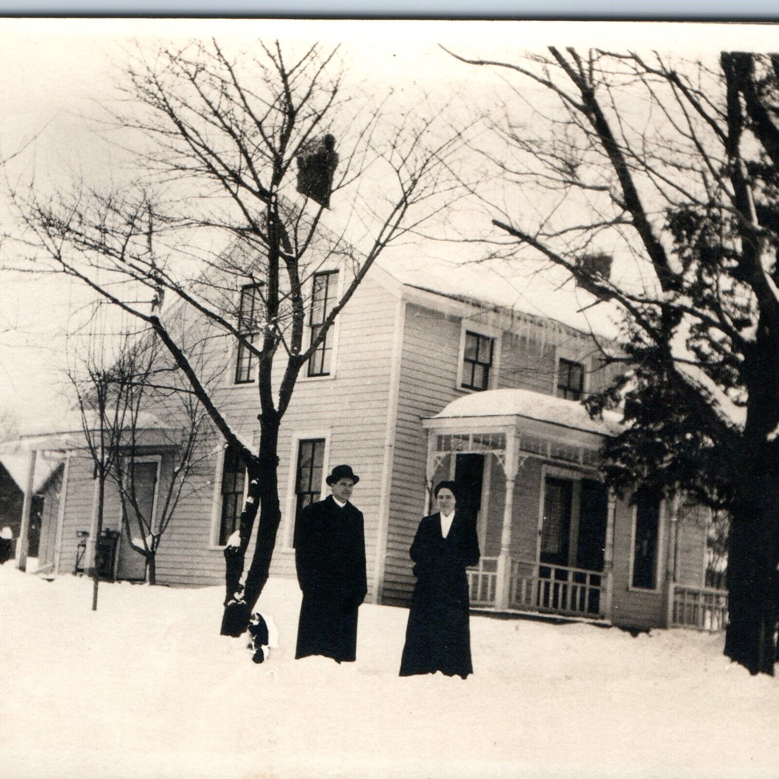 c1910s Outdoor Couple RPPC Winter Snowy House Porch Trees Sharp Real Photo A261